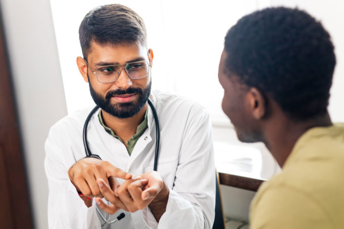 Family Doctor with patient