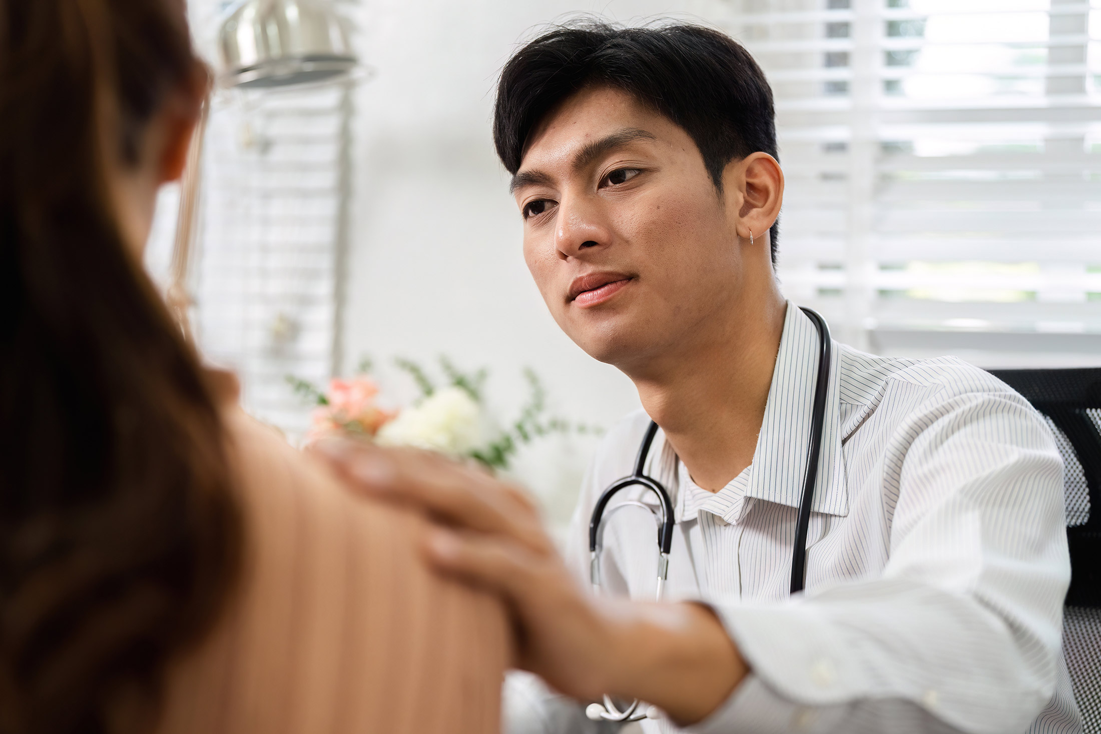 doctor talking with patient about alcohol misuse