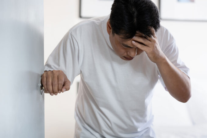 sick middle-aged man suffering fro stroke